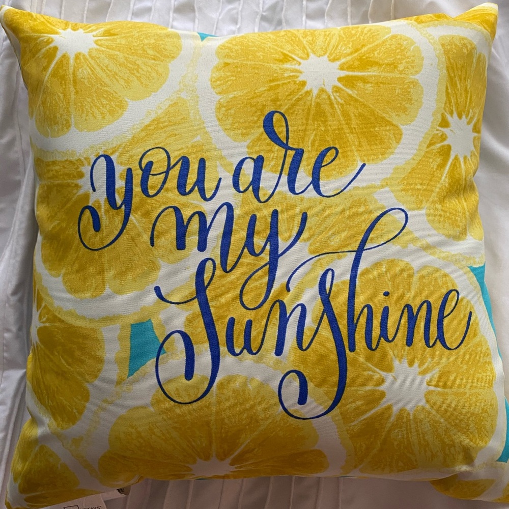 yellow throw pillow